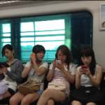 Cell phone users in Seoul subway